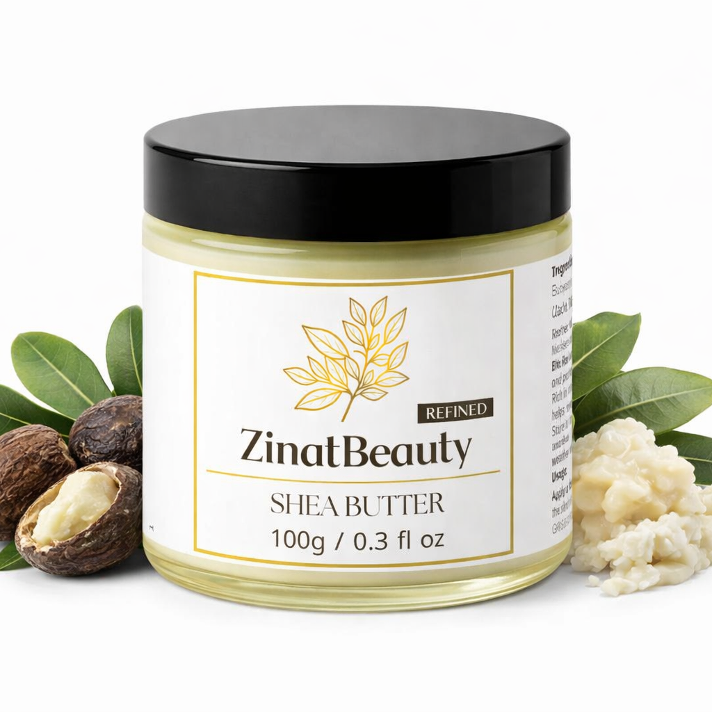 Jar of ZinatBeauty shea butter with leaves and shea nuts on a white background