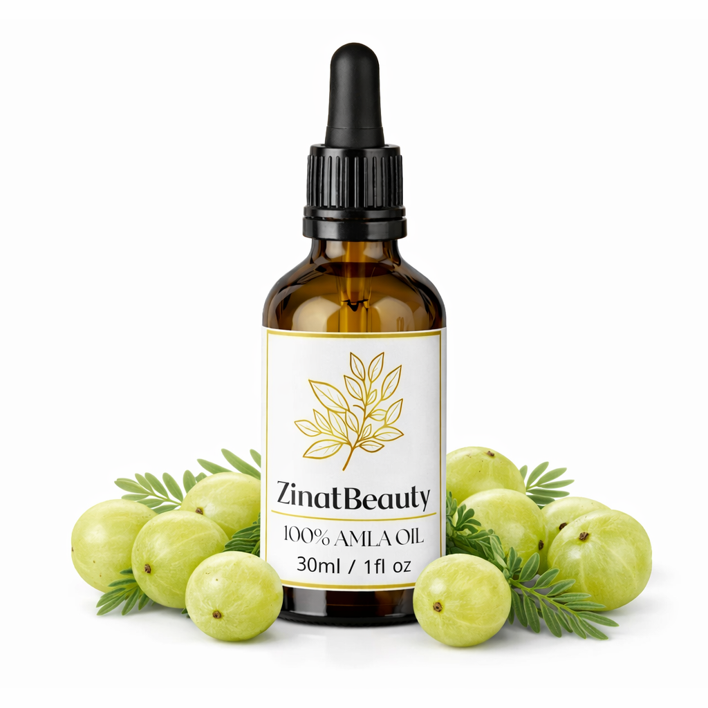 ZinatBeauty Amla oil bottle with amla fruits on a white background